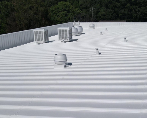 Commercial metal roof with coating