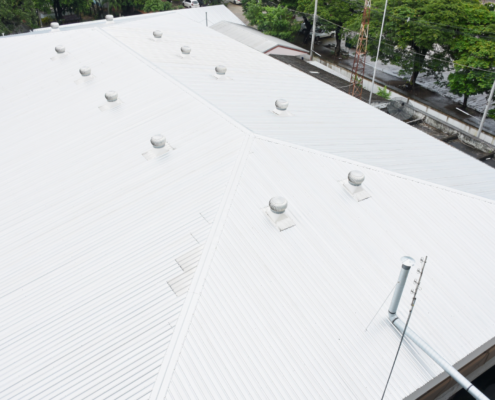White metal roof with vents